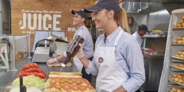 Employees at Jersey Mike’s prepare subs “Mike’s Way” with lettuce, tomatoes, onions, oil and vinegar. The sub chain will open its newest Southwest Florida location Aug. 13 at The Shoppes at Yellow Pine in Babcock Ranch, with a fundraiser benefiting Babcock Schools Trailblazers.