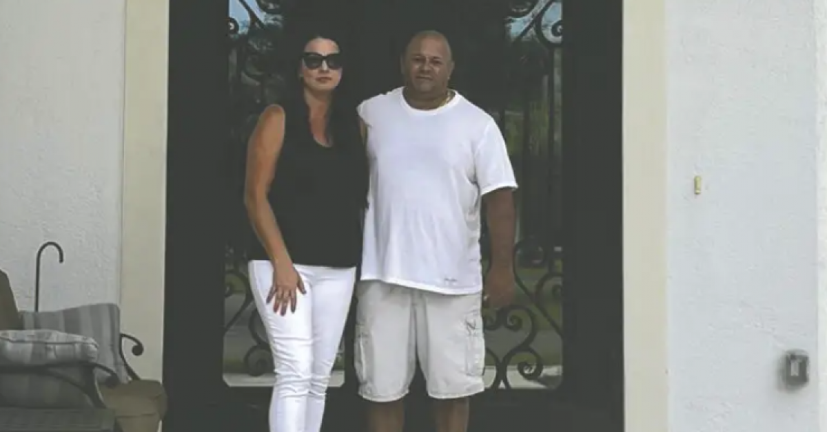 Monika and Paul Gatto in front of their Livingston Woods home built by Nova Homes of South Florida